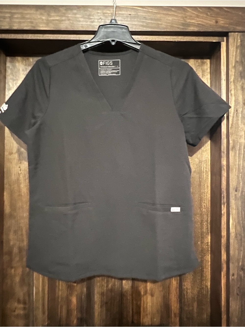 Figs Women’s Black V-Neck Short Sleeve Scrub Top with embroidery